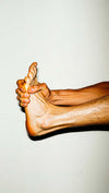 Foot being rubbed for tension relief