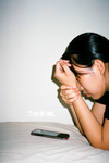 Wrist strain from phone — desk worker tension