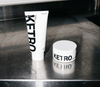 Ketro Stack — RX Pain Gel and CALM Magnesium Cream on stainless steel surface